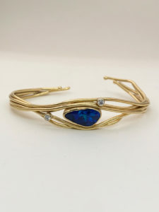 cuff bracelet with big boulder opal