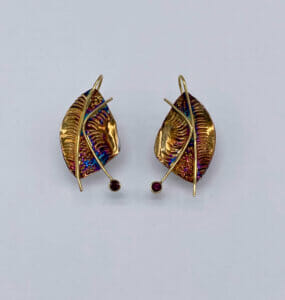 leaf-shaped earrings with pyrope garnets