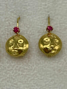 Spirer signature gold mask with ruby accent earrings