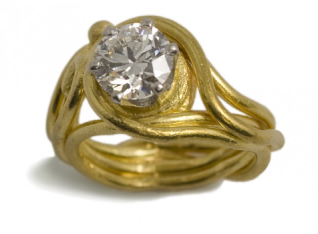 Daniel R. Spirer Jewelers of Boston, Cambridge offers this 22k gold ring with 1.75 ct. ideal cut diamond in a platinum setting