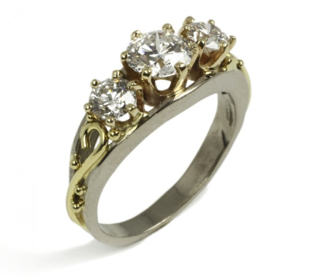 Three stone 18k palladium white gold and 18k yellow gold ring with Lazare ideal cut diamonds available at Daniel R. Spirer Jewelers of Cambridge, Massachusetts