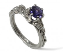 Engagement ring in 950 platinum with purple sapphire