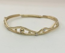 18k Gold Adjustable Bangle Bracelet with Diamonds. 18k Gold Adjustable Bangle Bracelet with Diamonds.
