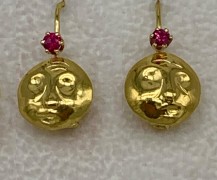 My signature gold mask earrings