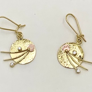 Red Comet Planets 18k yellow and pink gold with .12 ct. total weight, E color, VS clarity diamonds. Disc measures 5/8 inch.