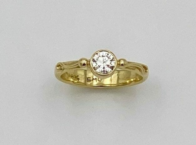 Tapered Diamond Band with Accents