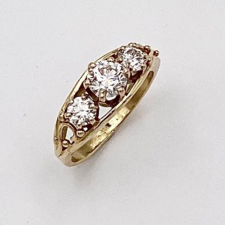 18k yellow gold, three diamond ring with a .60 ct, F color, VVS1 clarity center stone and a .24 ct, F color, VS1 diamond on one side and a .23 ct, F color VS2 clarity diamond on the other side. All three diamonds are ideal cut Lazare Diamonds