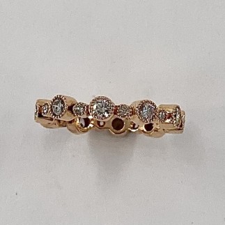 18k pink gold eternity band with big and little diamonds all around. Diamond TW is 1.02cts., E color, VS clarity