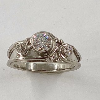 950 platinum antique style ring with a .48ct. F color, VS 1 clarity ideal cut Lazare Diamond