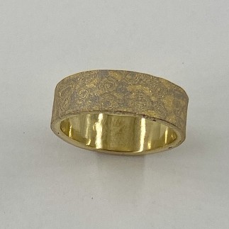 6 mm wide ring with 22k yellow gold and 18k palladium white gold mokume gane layered on top of an 18k yellow gold base