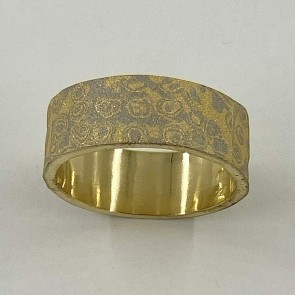 8.5 mm wide ring with 22k yellow gold and 18k palladium white gold mokume gane layered on top of an 18k yellow gold base