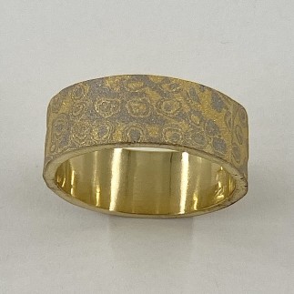 8.5 mm wide ring with 22k yellow gold and 18k palladium white gold mokume gane layered on top of an 18k yellow gold base