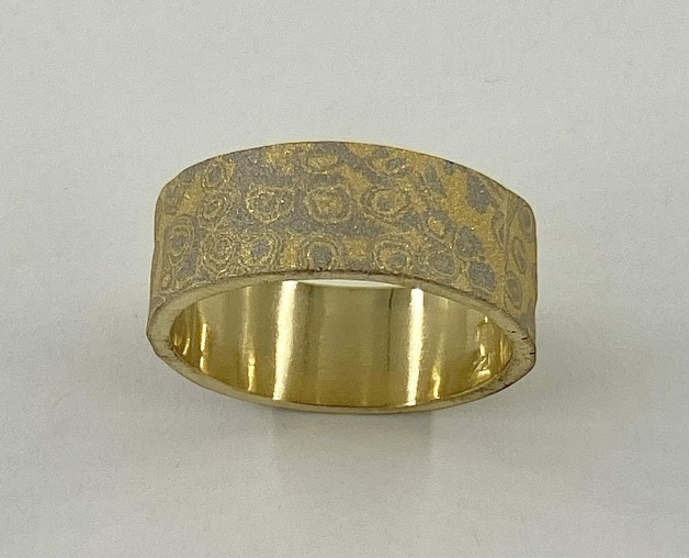 8.5 mm wide ring with 22k yellow gold and 18k palladium white gold mokume gane layered on top of an 18k yellow gold base