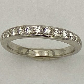 950 platinum band with 12 bead set diamonds, E color, VS1 clarity, TW.34ct, A great stacking ring!