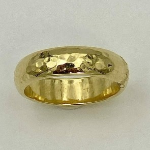 5mm wide, 18k yellow gold peened half round wedding band