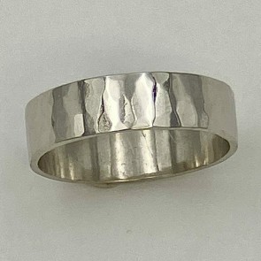 6mm wide, 950 platinum flat facet hammered wedding band