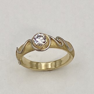 Sandblasted 18k yellow gold and 950 platinum ring with a .49ct, F color, VS2 clarity ideal cut Lazare Diamond