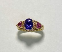 Purple Sapphire and Trillion Pink Sapphire Ring Purple Sapphire and Trillion Pink Sapphire Ring
