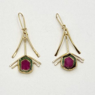 18k yellow gold earrings with 10.88ct.(TW) unheated watermelon tourmalines with 22k gold bezels and platinum backing. 2 inches long
