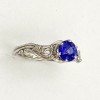 Viney 950 platinum solitaire ring with a 1.22ct. violet color change Sri Lankan sapphire (H) in a six prong setting.