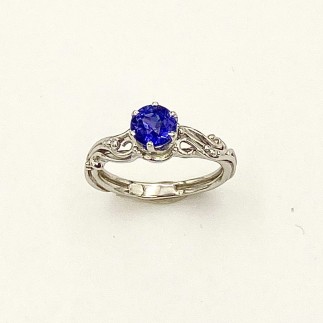 Viney 950 platinum solitaire ring with a 1.22ct. violet color change Sri Lankan sapphire (H) in a six prong setting.
