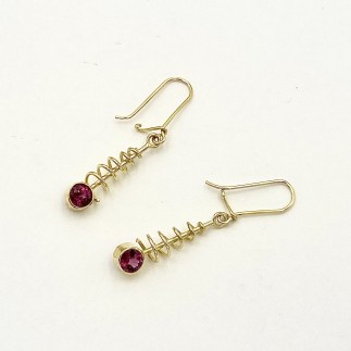 18k yellow gold coil earrings with Rhodolite garnets.  1.75 inches long.