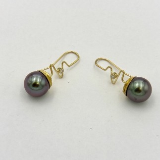 Greenish black South Sea pearls with a rose overtone with 22k yellow gold caps and 18k yellow gold wires with .09ct. (TW) E color, VS clarity diamonds.