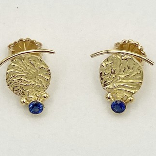 18k reticulated yellow gold earrings with .58 ct. (TW) with lively, medium blue sapphires.