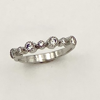 950 platinum ring with seven diamonds, E color, VS clarity, .38 cts. (TW)