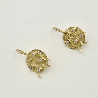 18k yellow gold  earrings with .35ct (TW) E color, VS clarity diamonds. Disk measures 5/8 inch across.