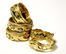 Floral and foliate 18k wedding rings