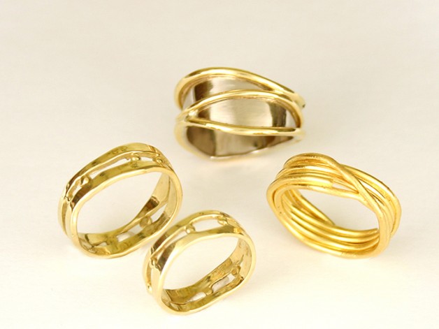 18k yellow gold, 18k yellow and white gold and 22k gold wedding bands-these and other wedding rings available at Daniel R. Spirer Jewelers of Cambridge