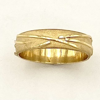 18k yellow gold, 6mm wide men's wedding ring with a sandblasted background and high polished wires.
