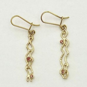 18k yellow Moonbeam earrings with .29 ct. TW  natural color orange sapphires.