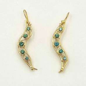 As in nature every peapod is unique. Stunning teal color Montana sapphires, 2 carats (TW), (H) in an 18k yellow gold cascade. Earring length is 2 inches.