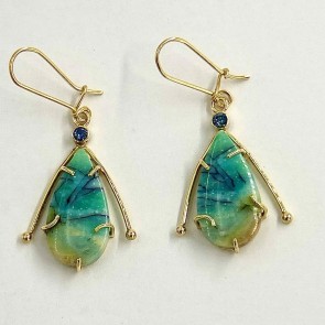 18k yellow gold earrings with Indonesian petrified opals weighing 14.73 cts. Earrings measure 2 inches long and are medium weight.