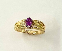 Oval Pink Sapphire Ring With Flowers and Vines.