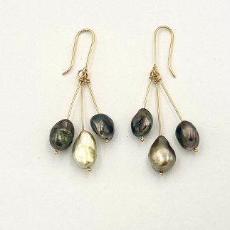 18k yellow gold earrings with natural color South Sea keshi pearls measuring 2 1/4 inches long.