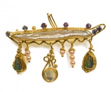 Brooch in 18k and 22k gold with pearls, boulder opals, rainbow moonstone and purple sapphires