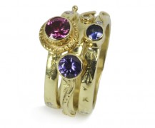 “Stackables” Purple, pink and blue sapphires in 18k yellow gold