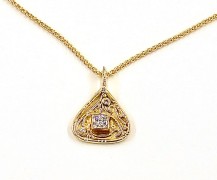 Custom 18k pendant with customer’s diamonds