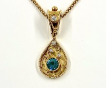 18k and 22k Gold Pendant with Tourmaline and Diamonds