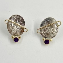 Silver and gold stud earrings with amethysts