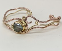 18k Pink and Yellow Gold Bracelet with Black Keshi Pearl. 18k Pink and Yellow Gold Bracelet with Black Keshi Pearl.