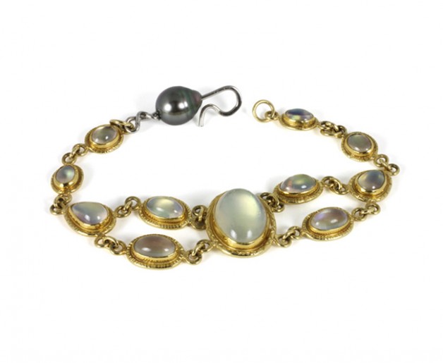 18k and 22k yellow gold bracelet with rainbow moonstones and South Sea black pearl available in the Boston Cambridge area at Spirer Jewelers