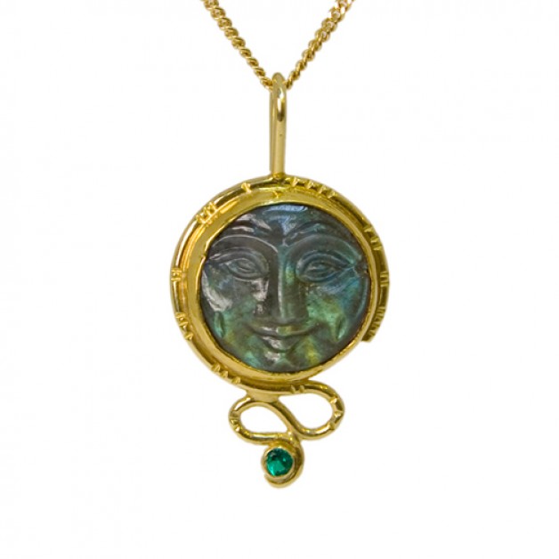 18k and 22k gold pendant with carved labradorite moon face and emerald available at Daniel R. Spirer Jewelers of Boston, Cambridge