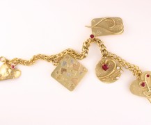 “Love Charm Bracelet” 22k gold and 18k white, yellow and pink gold with assorted gemstones